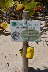 Educational sign and ashtrays  Reserve de Petite-Terre  Guadeloupe