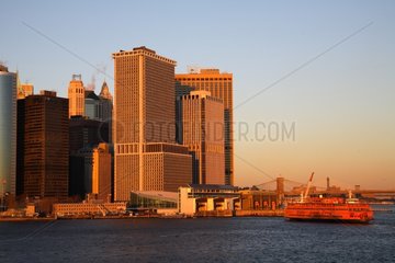 Arrival of a ferry boat in the pier of Manhattan New York