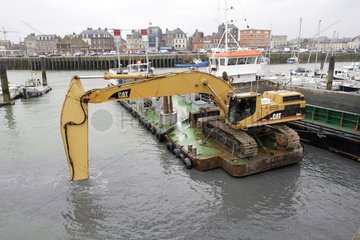Dredging in the harbor of Dieppe Normandy France