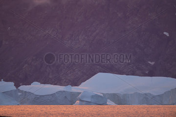 Icebergs in the colors of the night  Hall Bredning  Bear Archipelago  East Coast Greenland