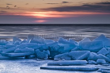 Sunrise over the frozen north shore of the Lake Superior