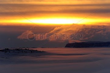 Sonnenaufgang zu Mittag Scoresbysund Fjord Grönland
