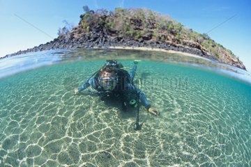 Diver in the lagoon Ilot of Choazil north of Mayotte