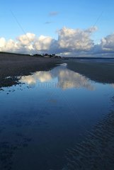 Reflection of clouds at low tide Côte de Nacre Calvados