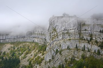 Fog on the cliffs - Cirque du Creux du Van Switzerland