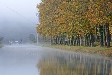 Tide gate on the Saone Canal in autumn - France