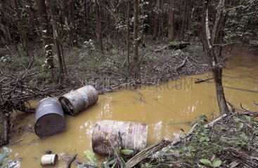 Chemical drums in illegal gold mining site French Guiana