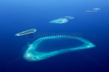 Aerial view of islands of the archipelago of Maldives