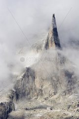 Aiguille Dibona in the clouds Oisans France