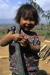 Young girl close to the lake Inle Myanmar