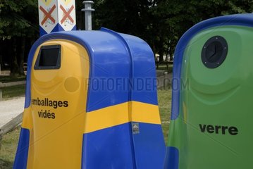 Containers of recycling on a highway rest area France