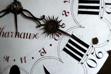 Spires and dial of an old clock