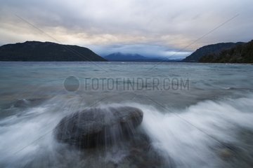 Waves breaking over rock Lake Nahuel Huapi Patagonia