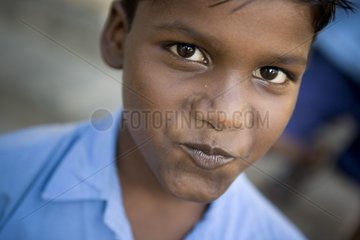 Portrait of Boy in the courtyard of her school Pondicherry India