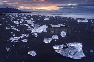 Ice blocks on black sand beach Joekulsárlón Iceland
