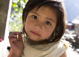 Portrait of girl Manang Village Annapurna Nepal