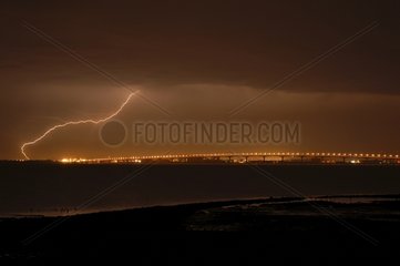 Lightning above the bridge of the Re Island