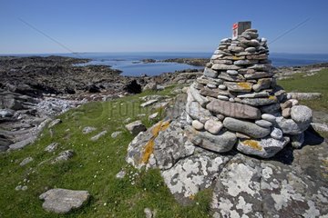 Stone cairns waymarking path - Balranald North Uist Scotland
