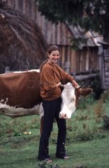 Girl and cow Romania [AT]