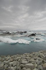 Icebergs floating in Jokulsarlon glacial lagoon Iceland