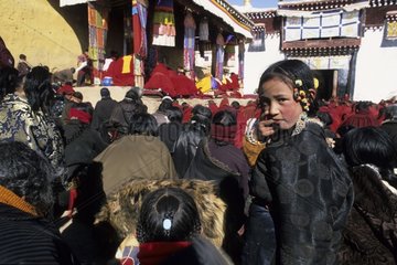 Young girl in a Buddhist ceremony Monastery of Serxu