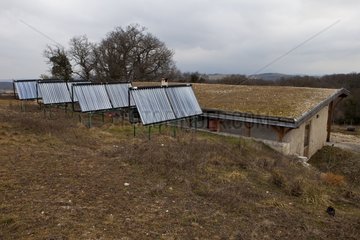 Solar panels and roof terra 'The Amanins' France