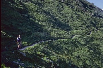 Hiker on path Alps France