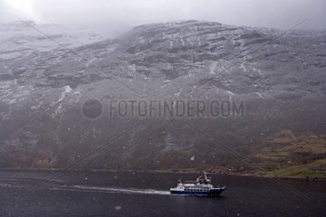 Cruise boat in the Geirangerfjord in winter Norway