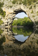 Reflection of Pont d'Arc in the gorges of Ardeche France