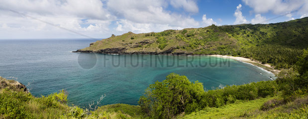 Panoramic view of the bay and white sand beach Hanatekua  Hiva Oa  Marquesas Islands  French Polynesia