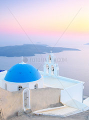 Chapel of Agiou Stylianou  Agiou Mina and sunset light  Fira  Thira  Santorini island  Cyclades archipelago  Greece