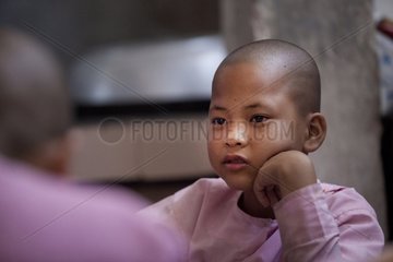 Otama portrait of a young nun of 10 years in Burma