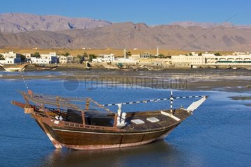 Dhow in the harbor of Sur in Oman