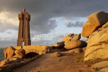 Lighthouse and rocks of pink granite coast in Ploumanac'h