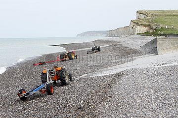 Tractor towing fishing boats - Normandy France
