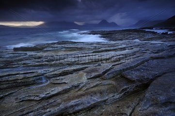 Waves crashing on a cracked coastal slab Scotland