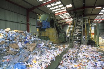 Waste on a treadmill in a factory sorting