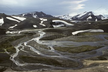 Volcanic landscape in the snow melts in Iceland