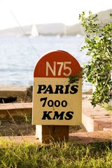 Humorous milepost in Martinique Island