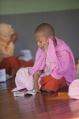 Study of a book of theology in a Buddhist monastery Burma