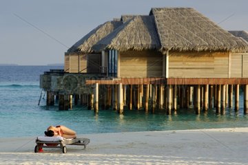 Siesta on the beach of the hotel Beach House in Maldives