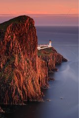 Neist Point lighthouse at dusk Isle of Skye Scotland