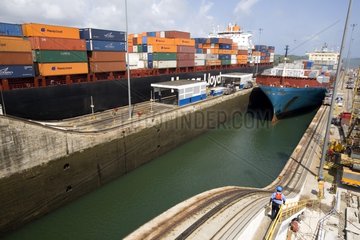 Container ships running the Gatun locks Panama Canal