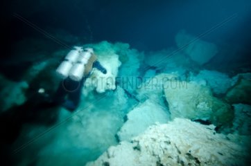caver diver in Cenote of Chahakmol Yucatan Mexico