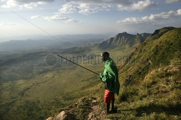 Man watching the Rift Valley near Maralal Kenya