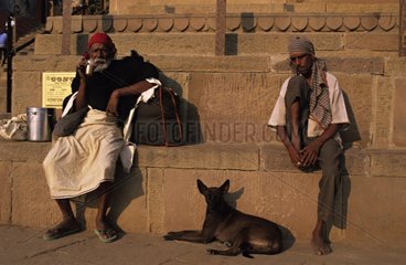 Men and Dog sitting on ghats India