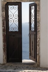 Door open to the sea island of Santorin