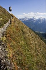 Hiker in Grisons National Park Switzerland