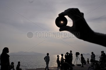 Observing an annular eclipse of the Sun Java Indonesia