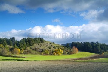 landscape of hills and fields in automn Auvergne